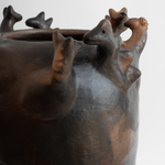 Julia Isidrez, Vasija con ocho cabezas, 2024