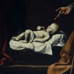 Detail of an oil painting of the nativity.