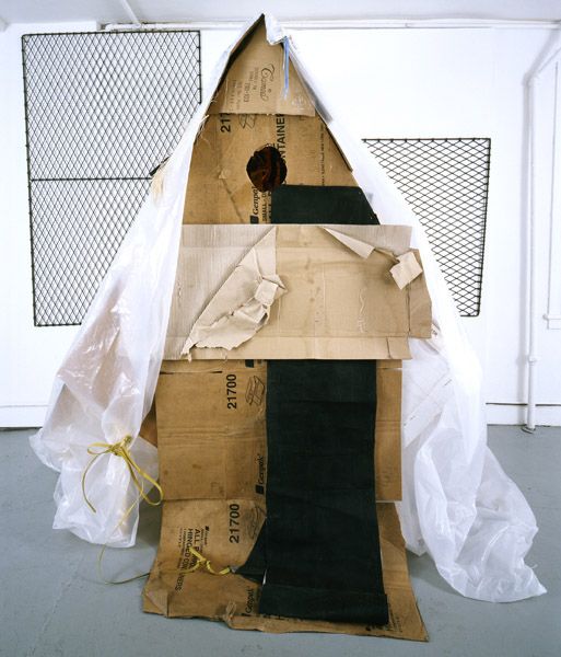 Installation view of Lizzi Bougatsos, Birdhouse for Humans, 2007, cardboard, metal grating, and mixed mediums, 113 x 97 x 93 in. Street Feather, 2007, James Fuentes LLC, 35 St. James Place. Courtesy of James Fuentes Gallery.