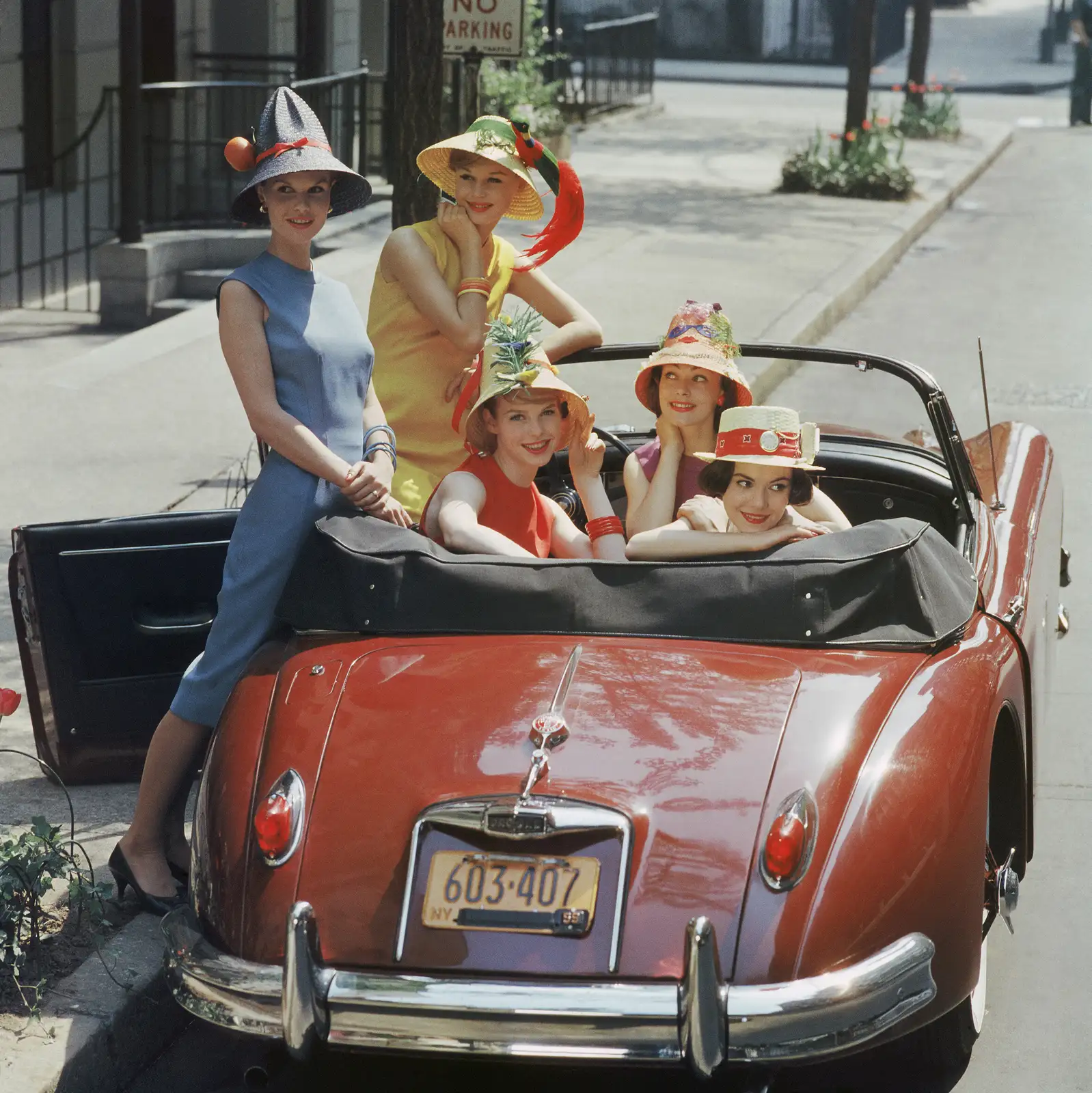 Mark Shaw, Beach Hat Models in Red Jaguar, 1959