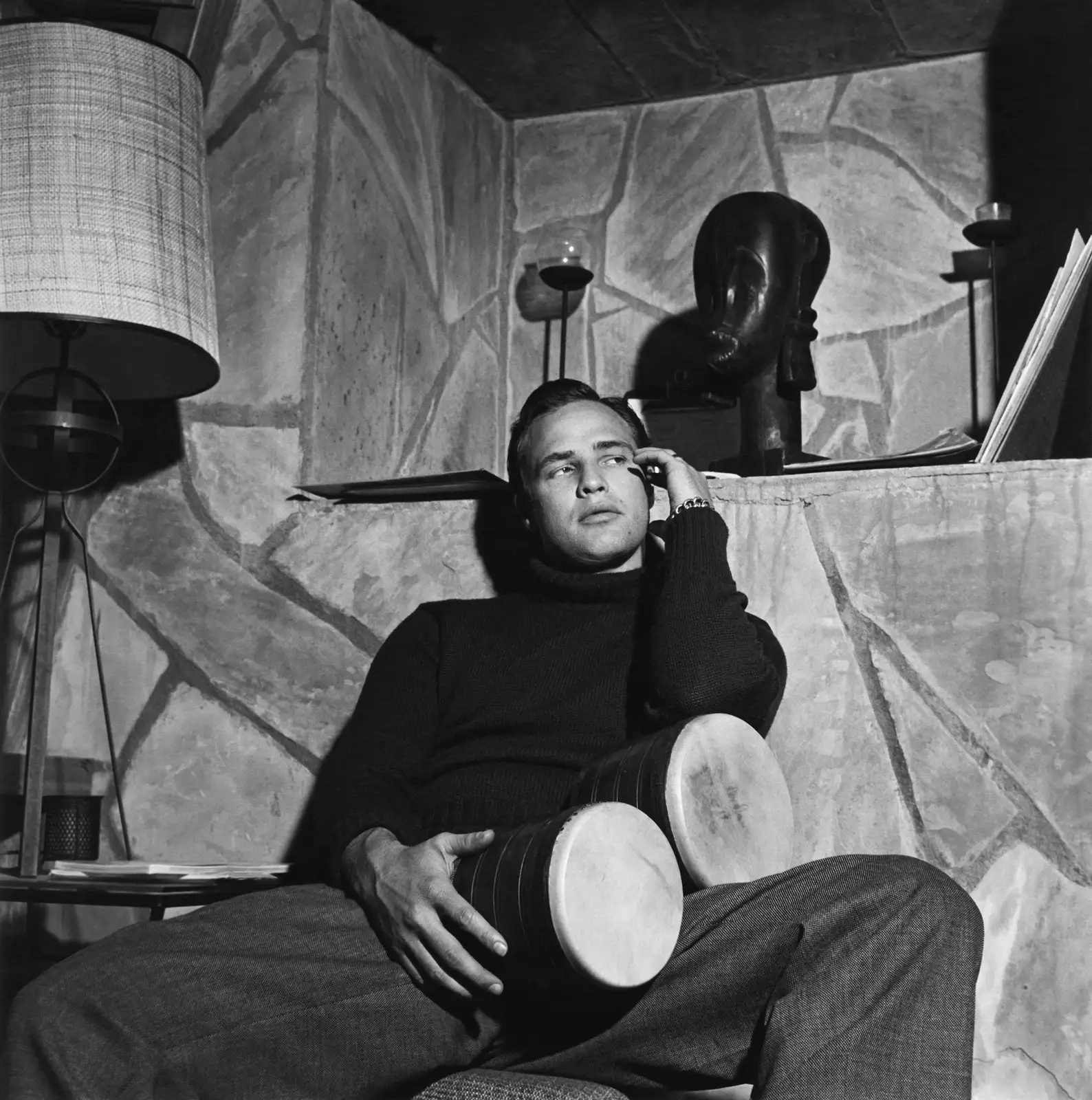 Sid Avery, Marlon Brando with Bongo Drums in the Den of His Beverly Glen Home, 1955