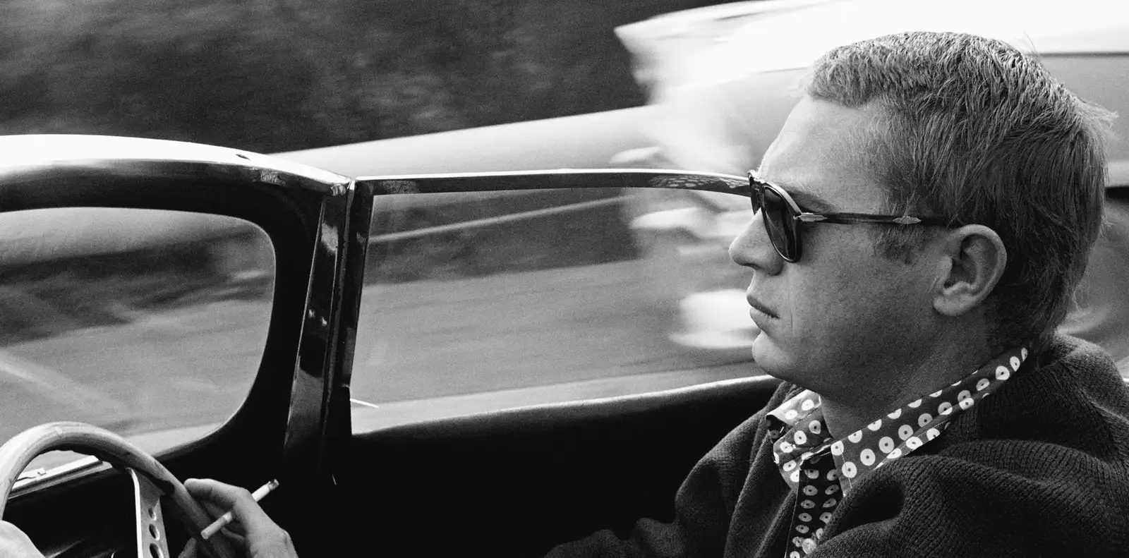 Sid Avery, Steve McQueen driving through Nicolas Canyon, 1957