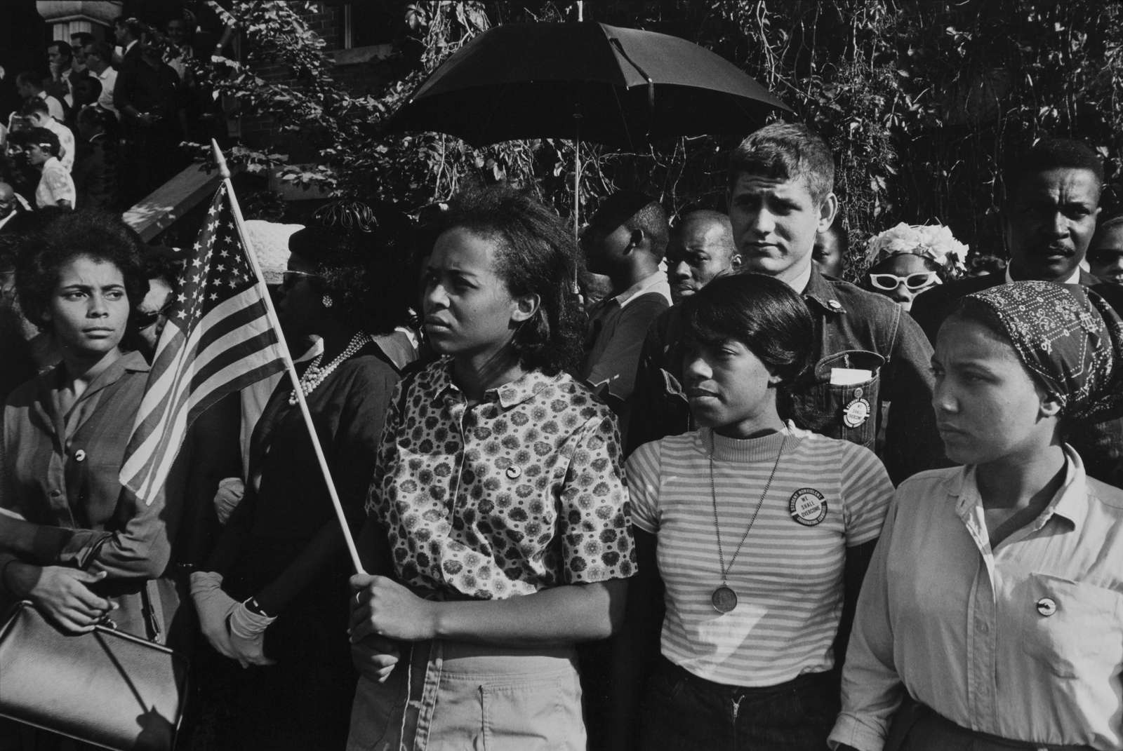 Danny Lyon, SNCC workers stand outside the funeral: Emma Bell, Dorie Ladner, Dona Richards, Sam Shirah, and Doris Derby, 1963