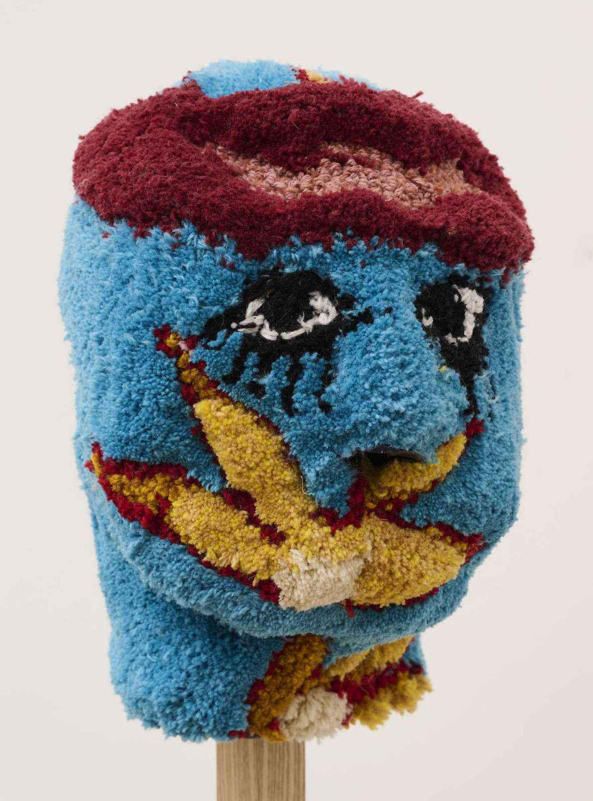 Anna Perach, 'Uncanny Valley (Azure)', 2025, axminster yarn, artificial leather, 43 x 20 x 39 cm.