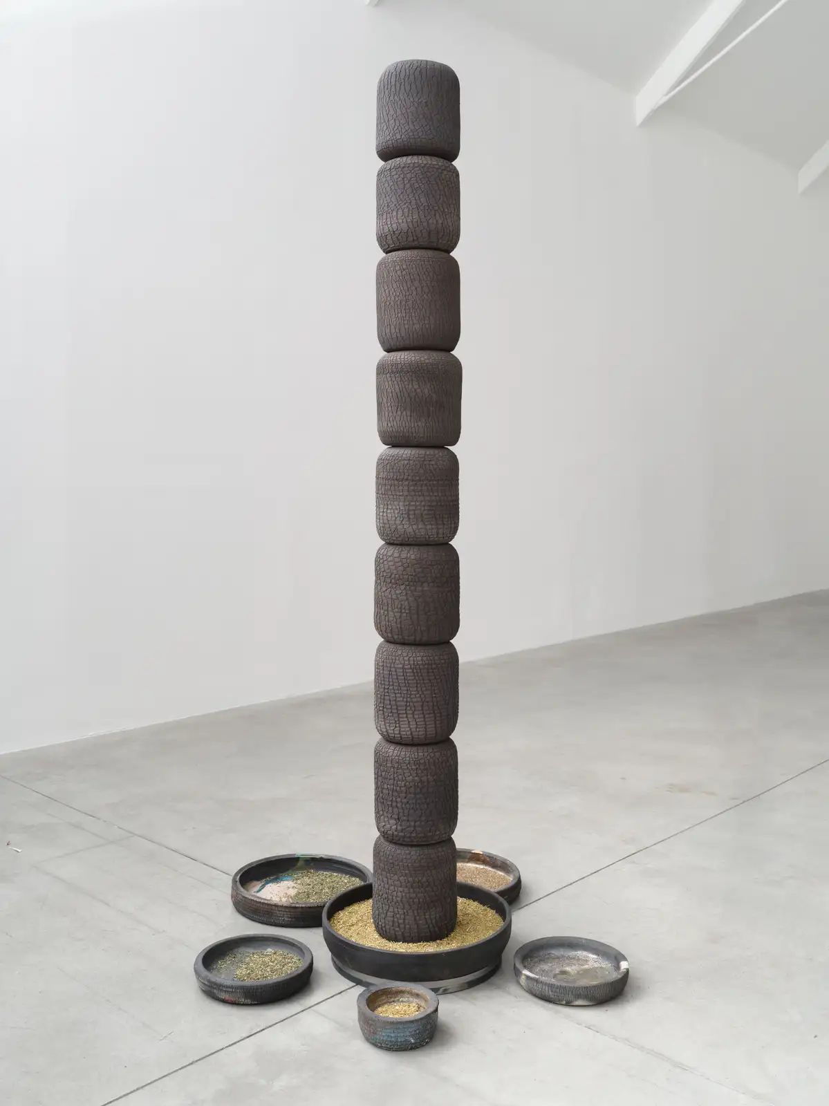 Otobong Nkanga, 'Beacon - Resilience', 2024. Metal pole with base; ceramic pieces; ceramic bases, pipe insulation, metal ballast, 206 x 120 x 105 cm © Otobong Nkanga, Courtesy Lisson Gallery.