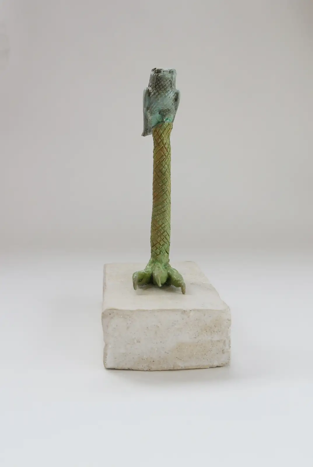 Ali Cherri, 'The Avian Spirit', 2021. Amulet of the Egyptian falcon god Horus in glass paste ancient Egypt late period glazed stoneware, 17 5 X 135 X 7 8 cm. Courtesy of the artist and Galerie Imane Farès, Paris.