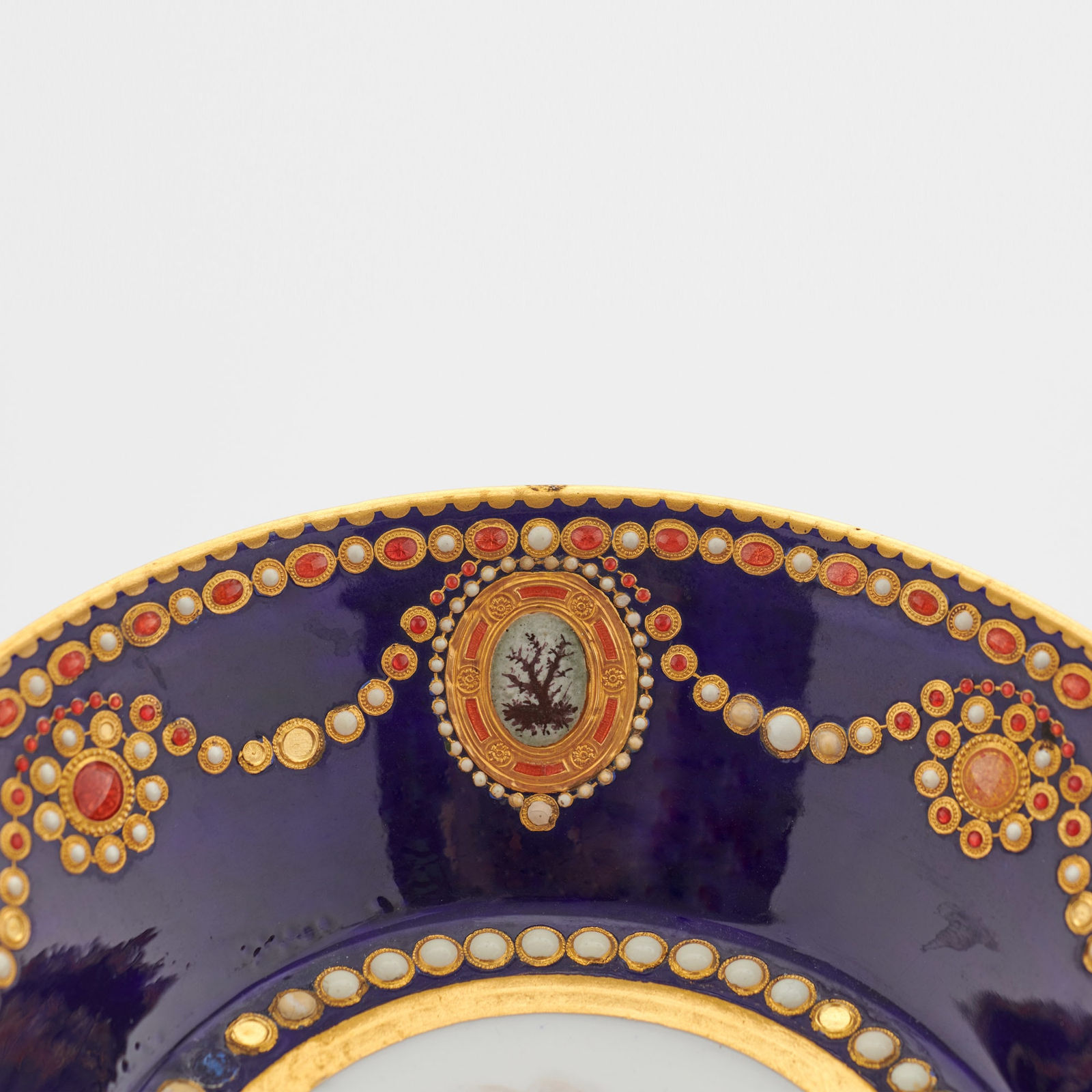 Sèvres Porcelain, A French 18th Century Soft-Paste Sèvres Porcelain ‘Jewelled’ Cup and Saucer, 1781