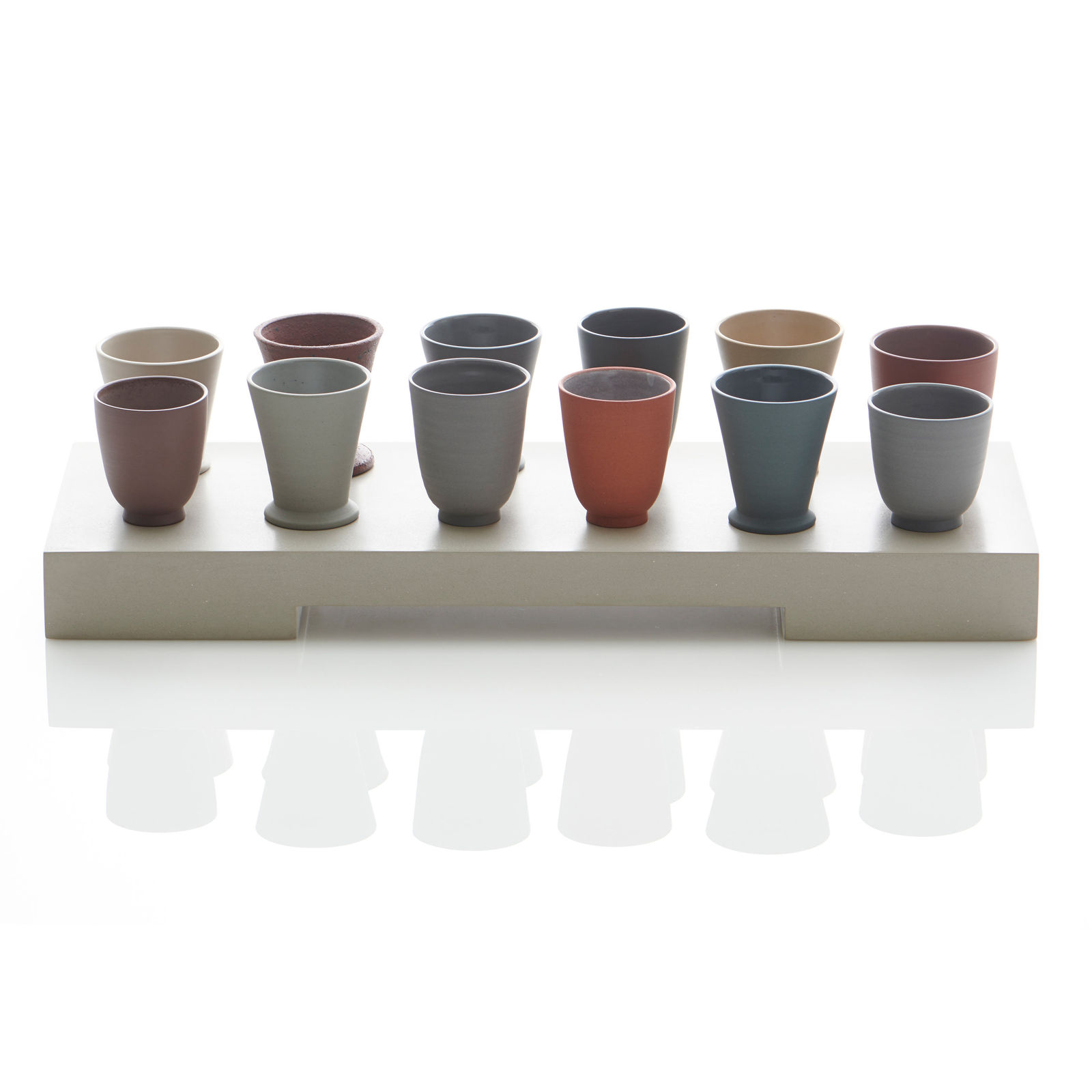 Julian Stair, Twelve Cups and Beakers on a Ground, 2018