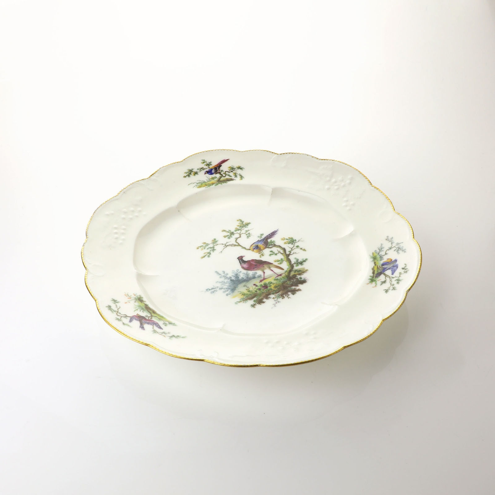 Sèvres Porcelain, A Soft-Paste Vincennes Porcelain Plate painted by Armand l'aîné , 1754