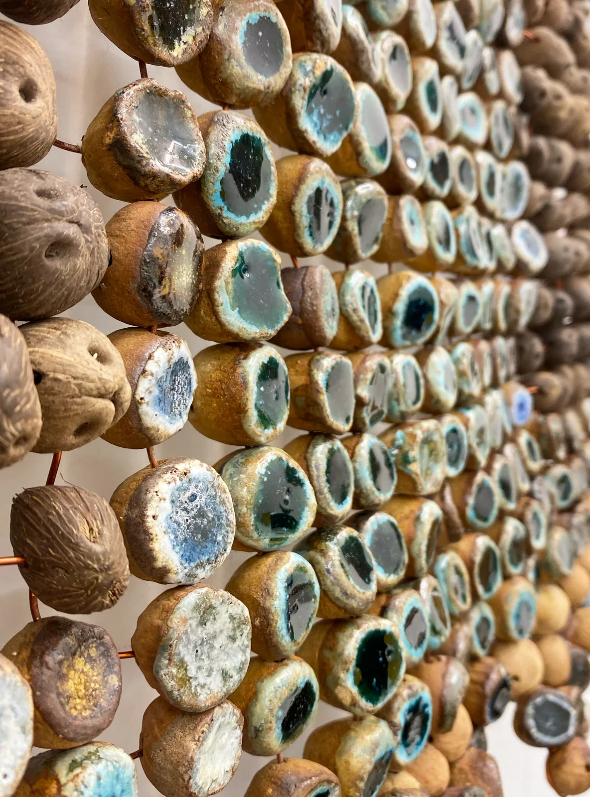 Ozioma Onuzulike sculpture. Nigerian Artist. Contemporary Art Gallery. AFIKARIS PARIS. Clay working process. Mixed media (earthenware, ceramic, natural resources) sculptures. Conversations on social changes. New Nsukka Art School. Art genève 2024. 1-54 Marrakech