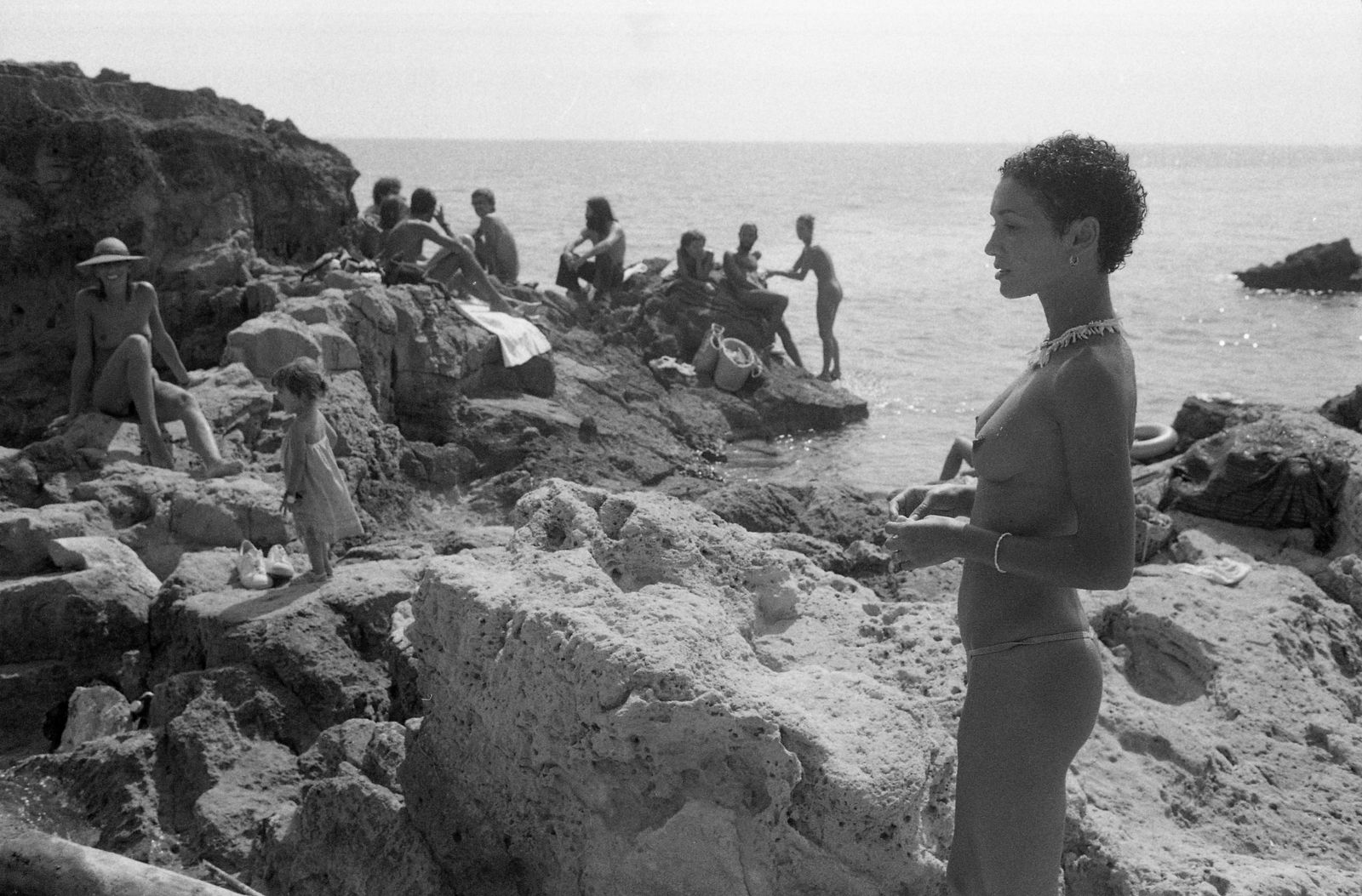 Oriol Maspons, The Staff of Ku Taking A Dip in Es Cavallet, Ibiza, Spain, cerca 1980