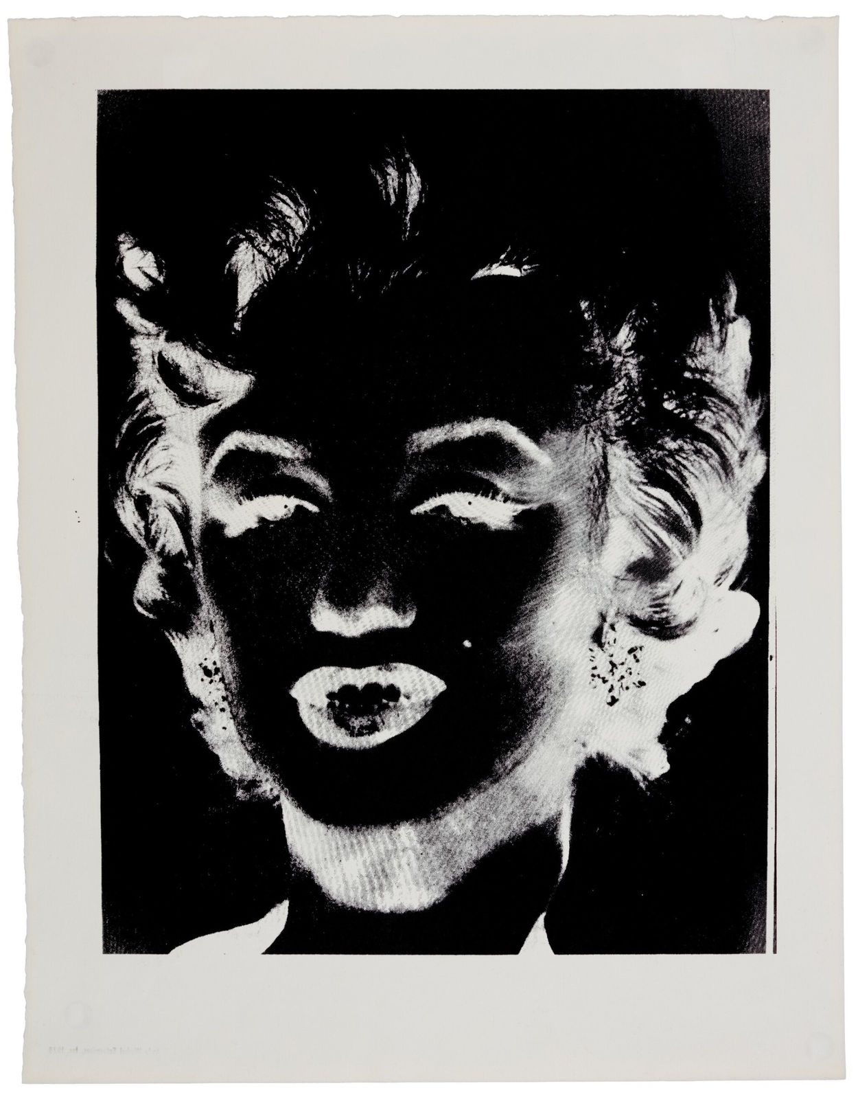 Black and white reversal image of Marilyn Monroe by Andy Warhol like a photographic negative printed on paper