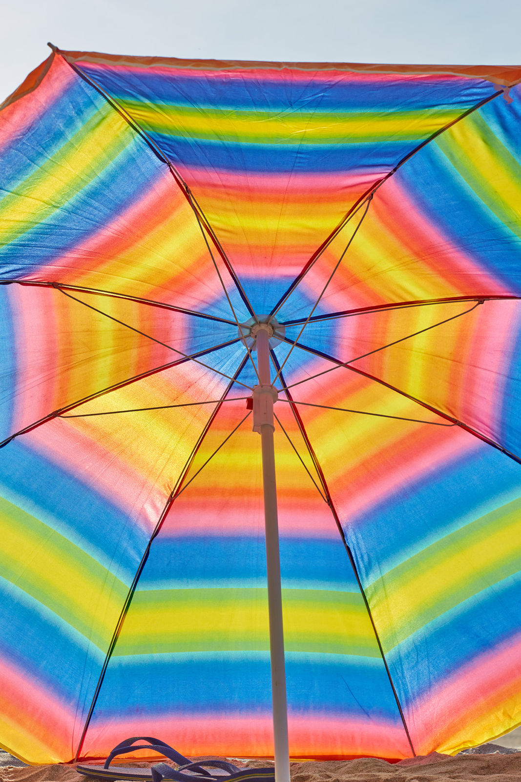 Roe Ethridge, Rainbow Beach Umbrella with Flip Flops, 2020