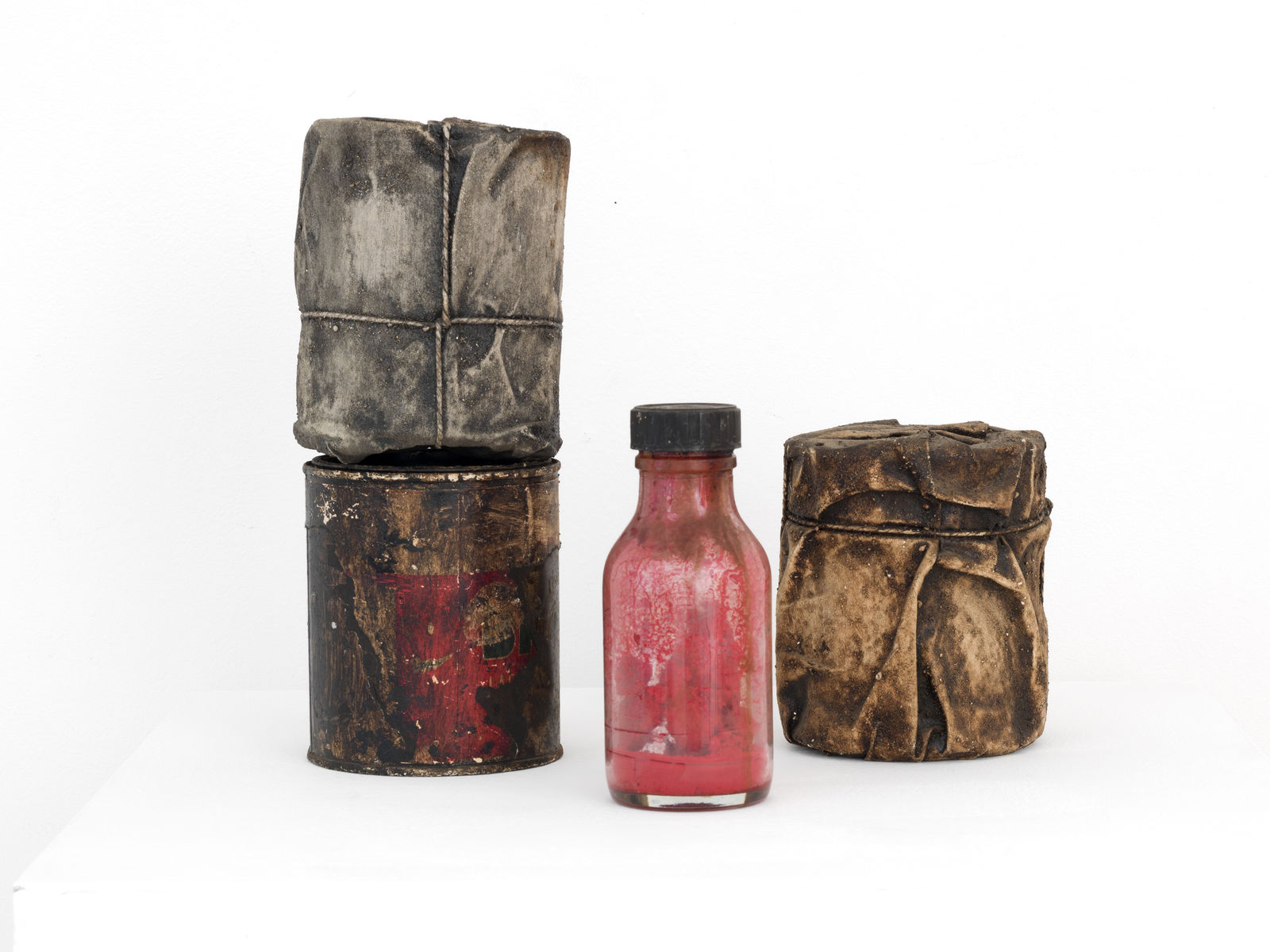 Christo, Wrapped Cans and a Bottle, 1958