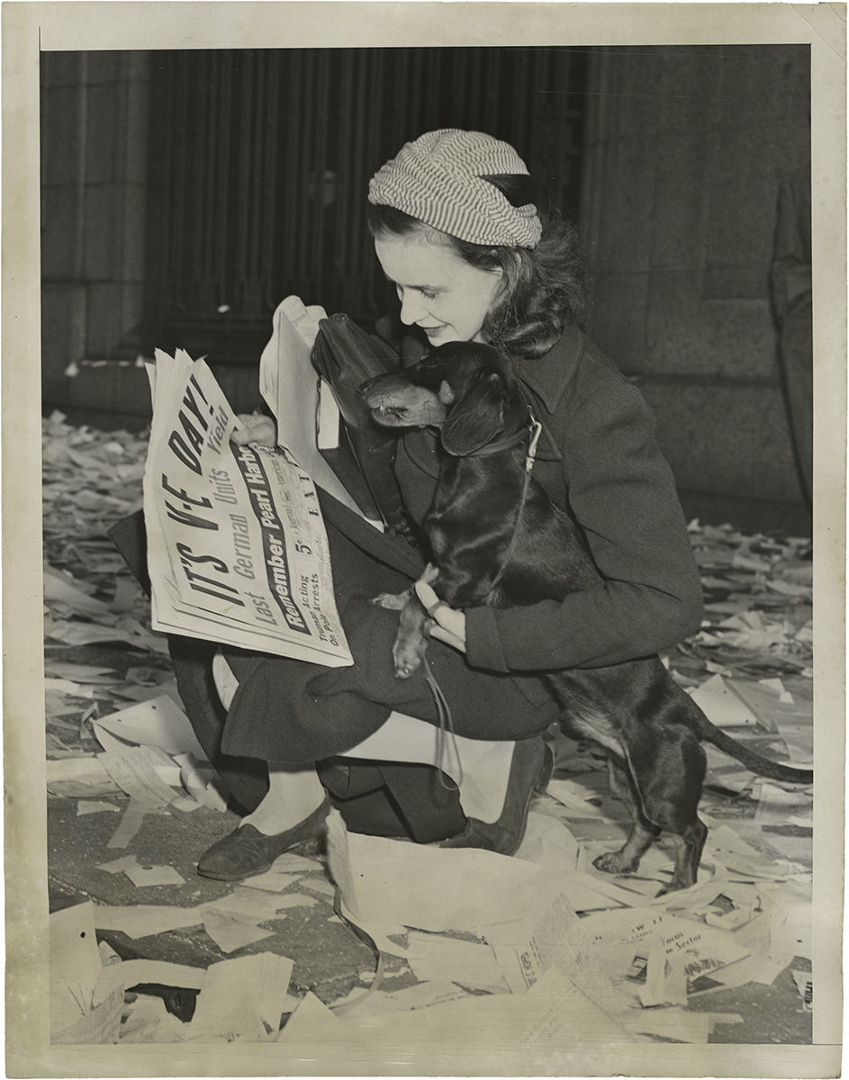 Weegee, Miss Elisabeth Ross Joined in the Celebration Touched off by the Premature Announcement, 1945