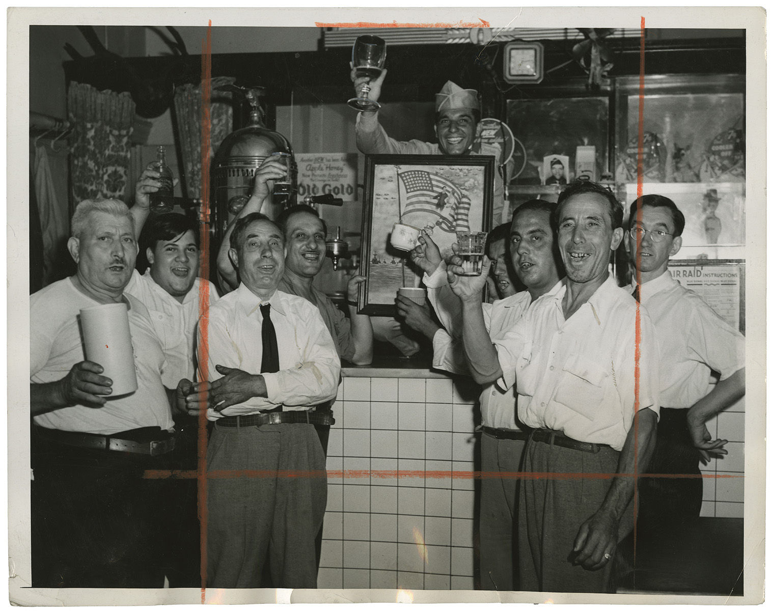 Weegee, Here's a Toast at Mott Street Café, 1943