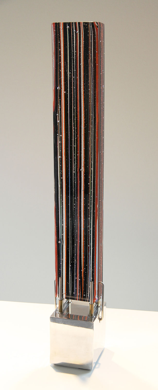 ANA MARÍA NAVA, LINEAL NEGRA/NARANJA