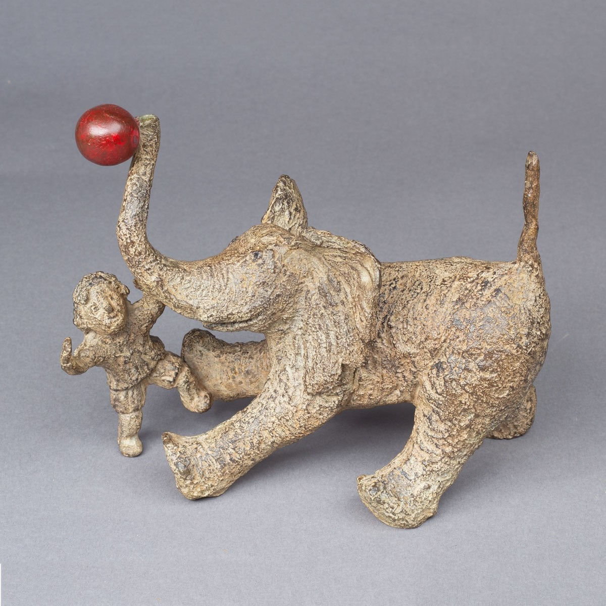 alex and his elephant cute and adorable animal contemporary bronze bear sculpture elephant playing a ball with a child sophie verger