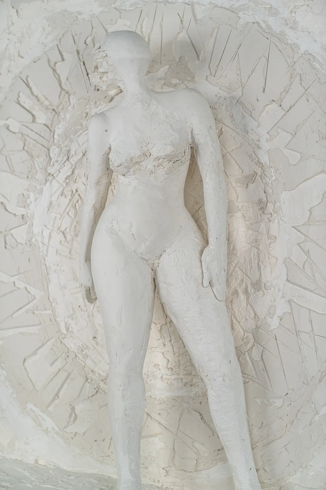 Female figurative relief in plaster by contemporary artist Emilio DiIorio. Relief is No. 4 in artist's Greek Muses series.