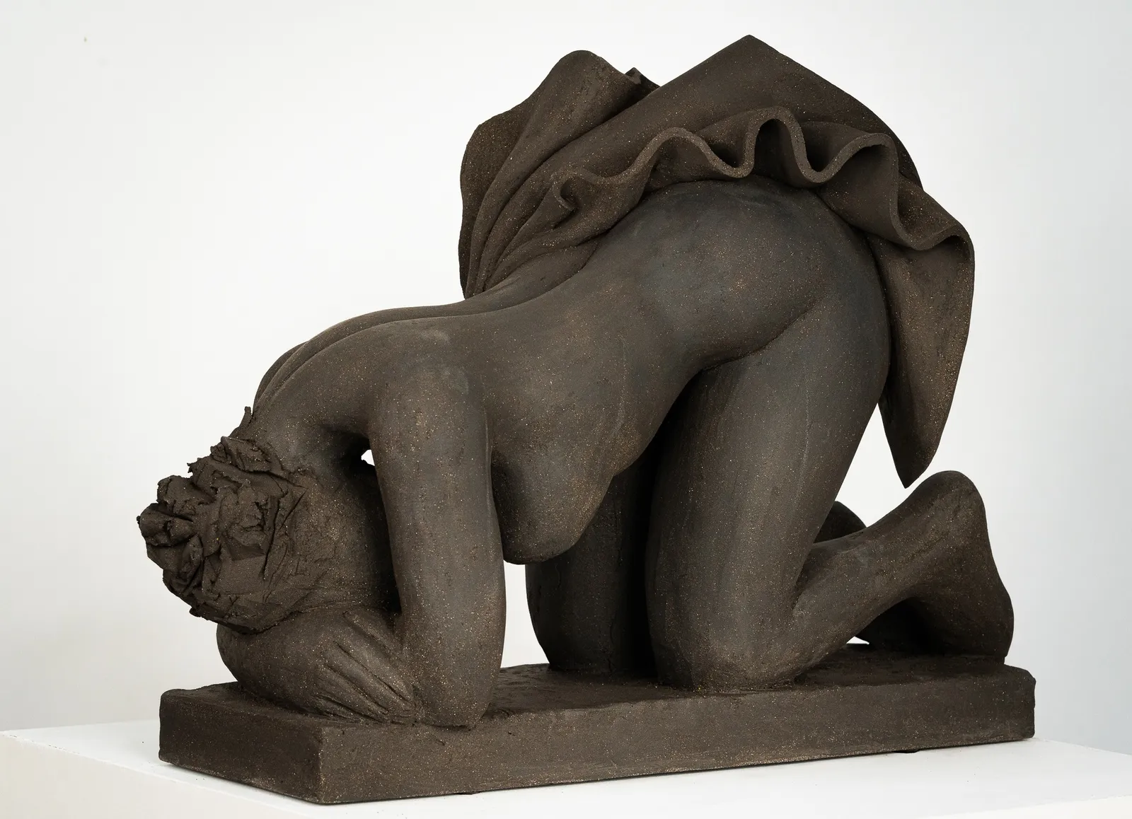 Figurative ceramics sculpture by artist Emilio DiIorio. Female figure is No. 5 in artist's Seated Bathers series in black clay.