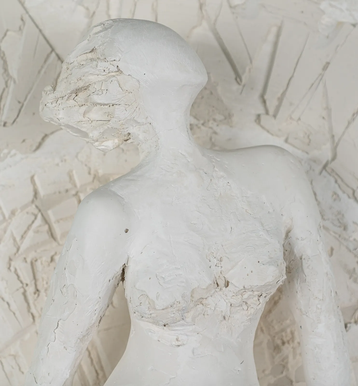 Female figurative relief in plaster by contemporary artist Emilio DiIorio. Relief is No. 4 in artist's Greek Muses series.
