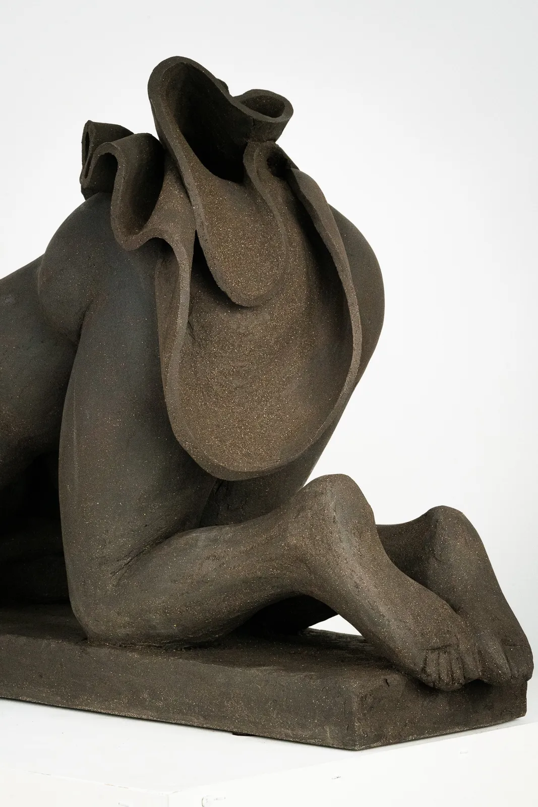 Figurative ceramics sculpture by artist Emilio DiIorio. Female figure is No. 5 in artist's Seated Bathers series in black clay.