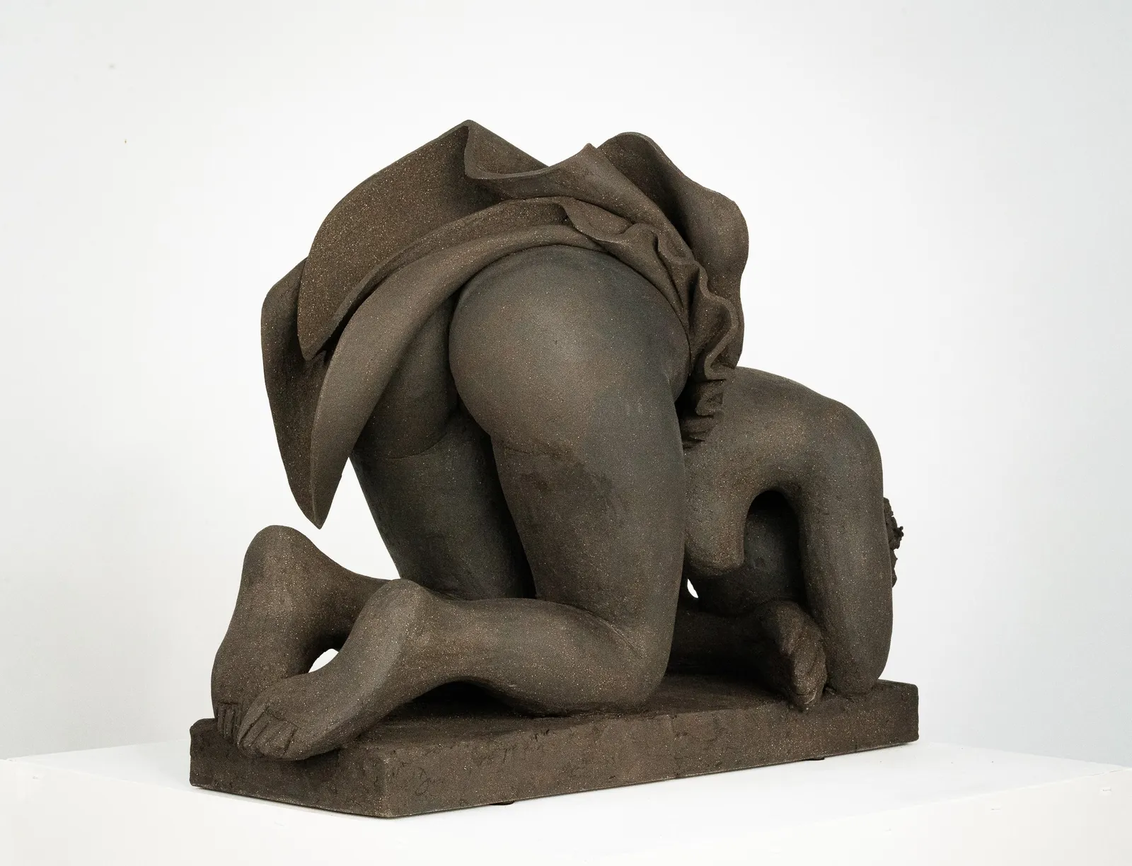 Figurative ceramics sculpture by artist Emilio DiIorio. Female figure is No. 5 in artist's Seated Bathers series in black clay.