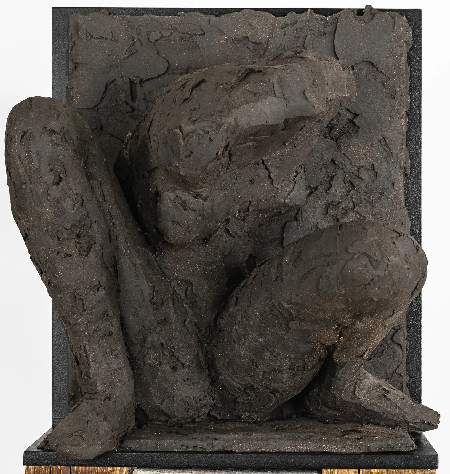 Ceramic relief in black clay in sculptor Emilio DiIorio's Women of Troy series.