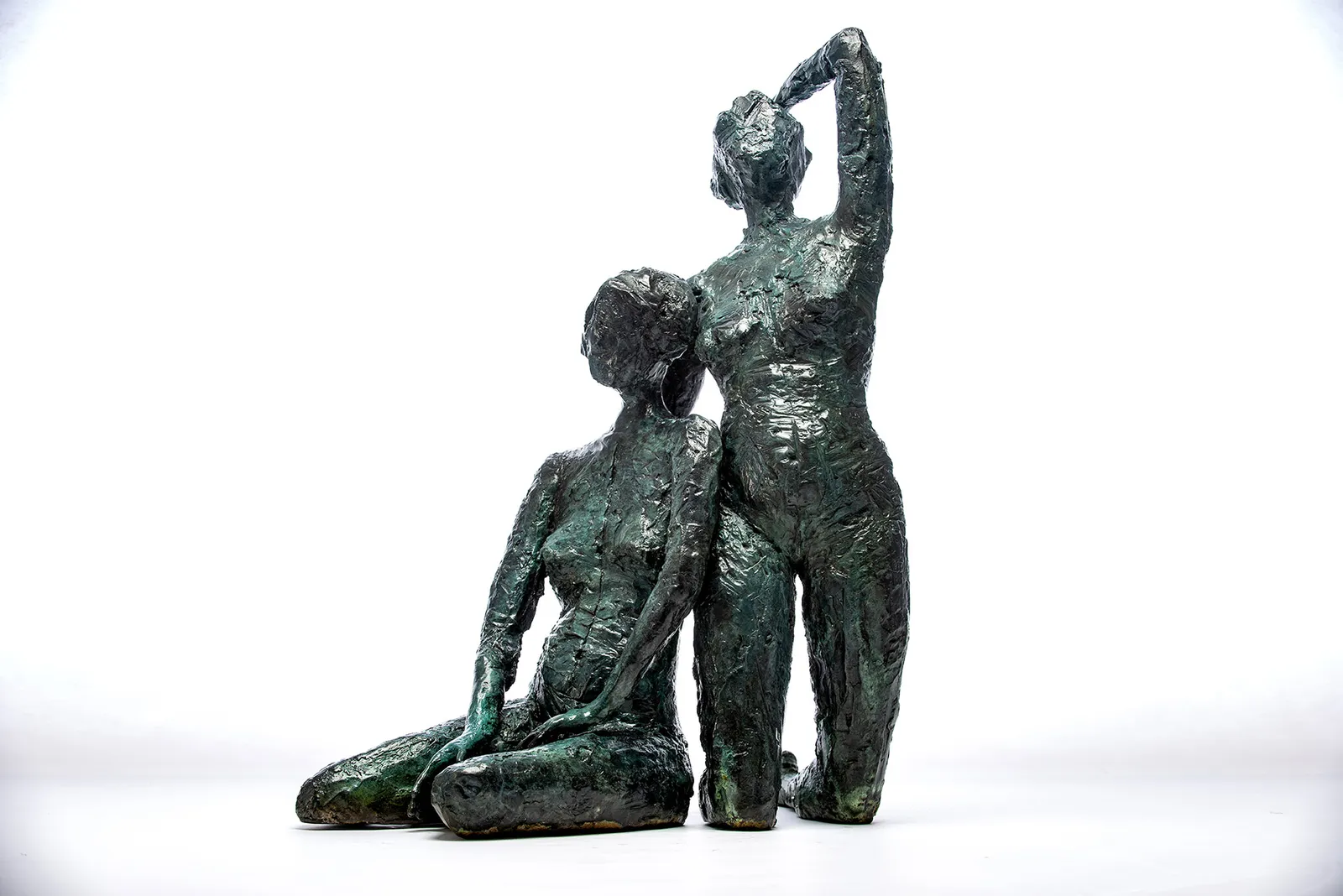 Bronze sculpture of two women by sculptor Emilio DiIorio.