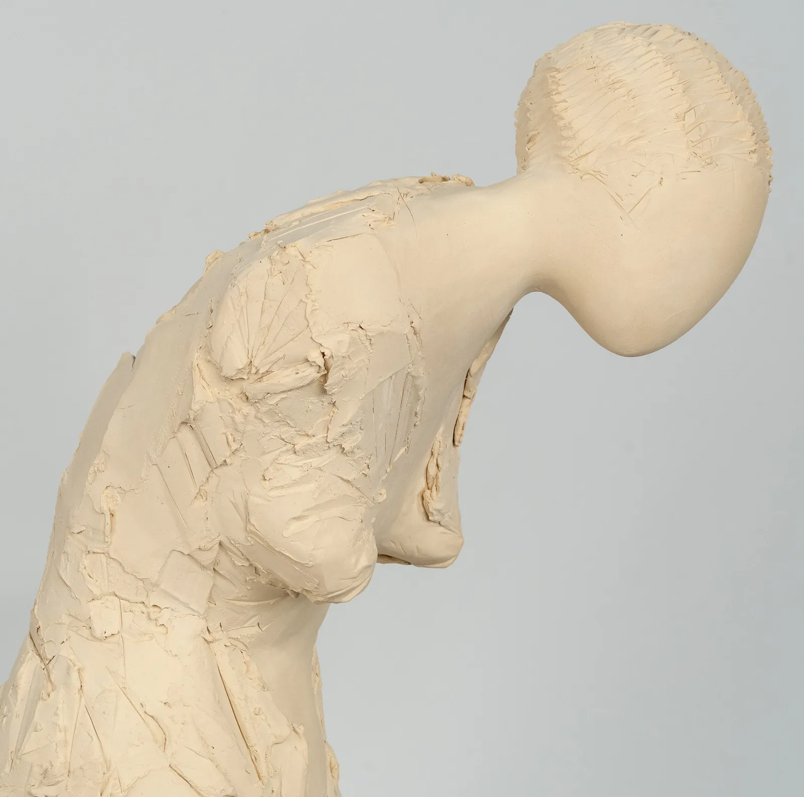 Fragmented figurative female torso in white ceramic. No. 3 in sculptor Emilio DiIorio's Sei donne series..