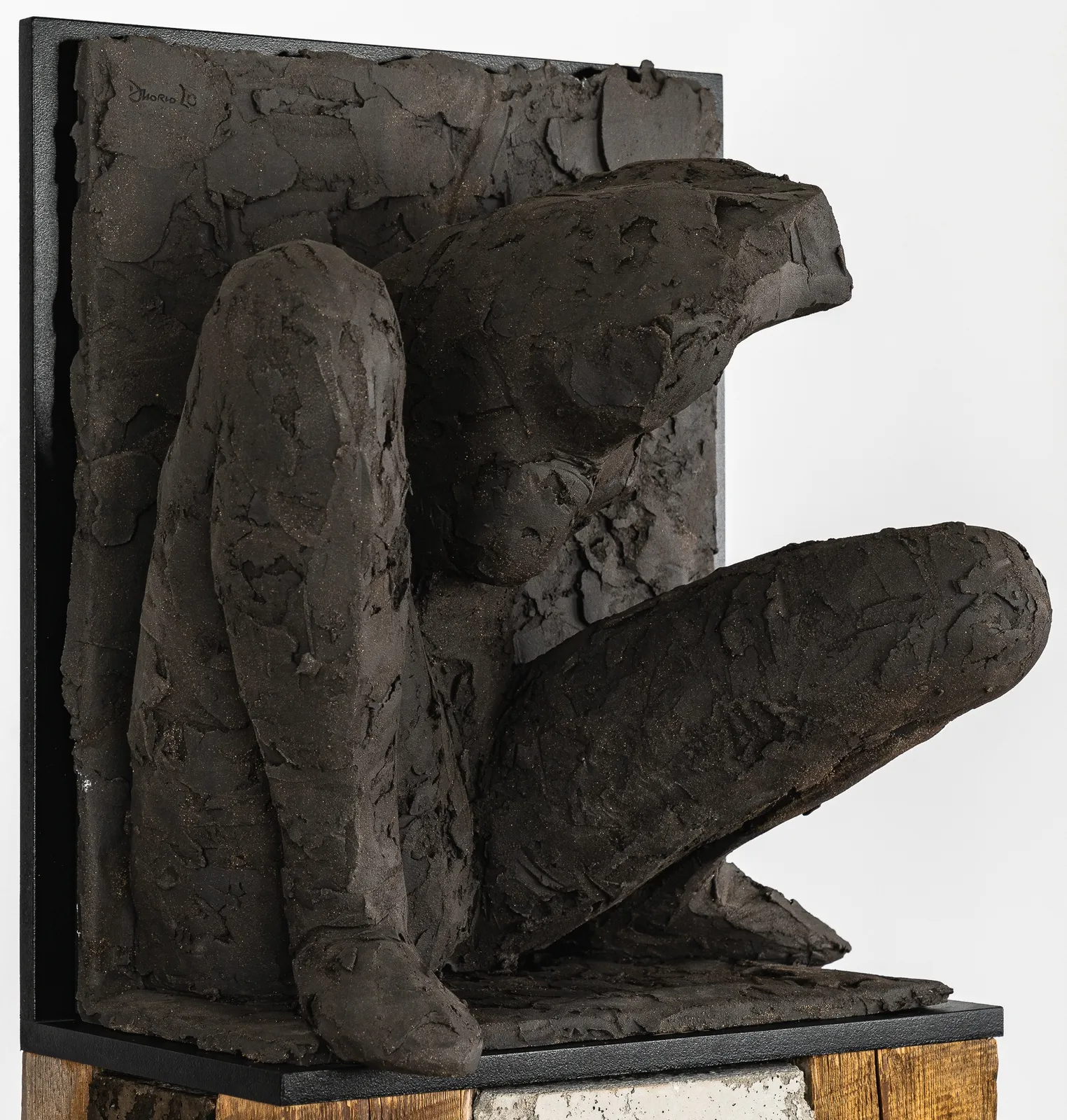 Ceramic relief in black clay in sculptor Emilio DiIorio's Women of Troy series.