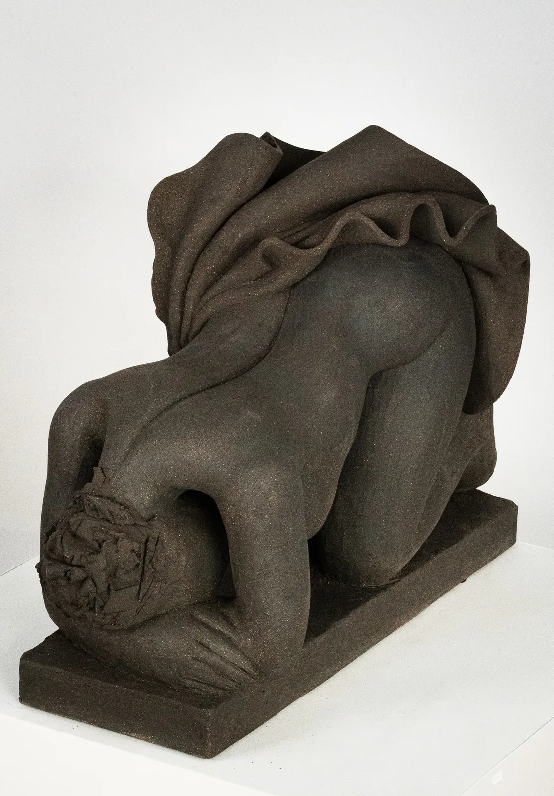 Figurative ceramics sculpture by artist Emilio DiIorio. Female figure is No. 5 in artist's Seated Bathers series in black clay.