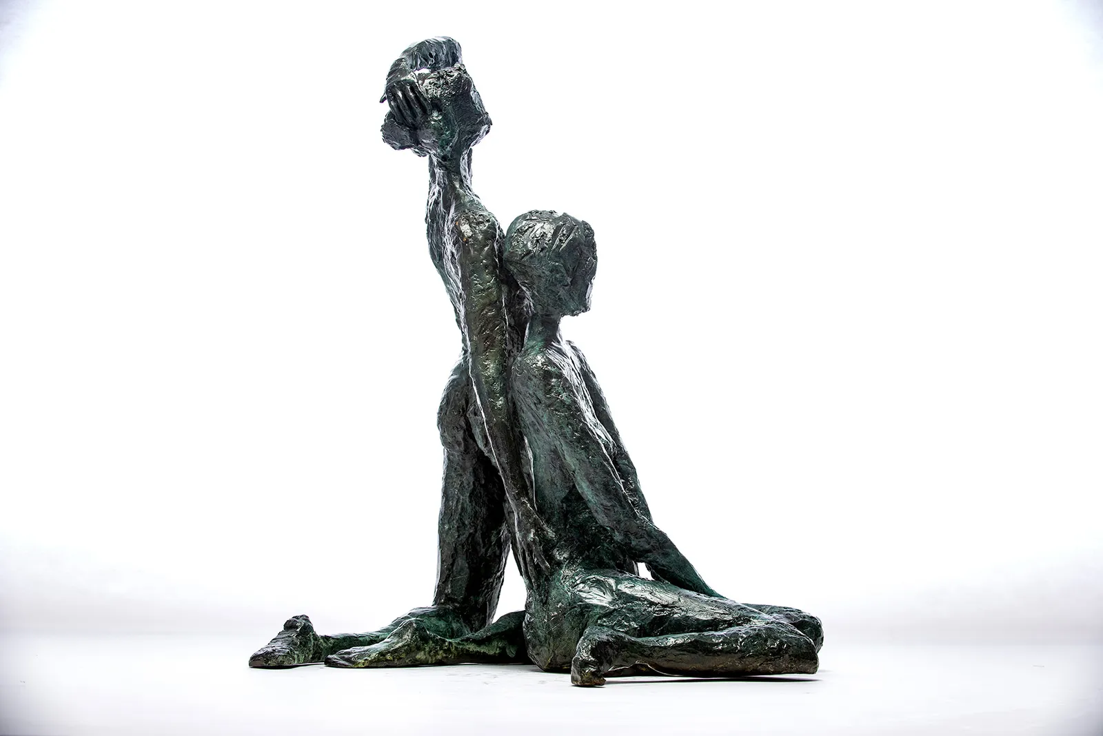 Bronze sculpture of two women by sculptor Emilio DiIorio.