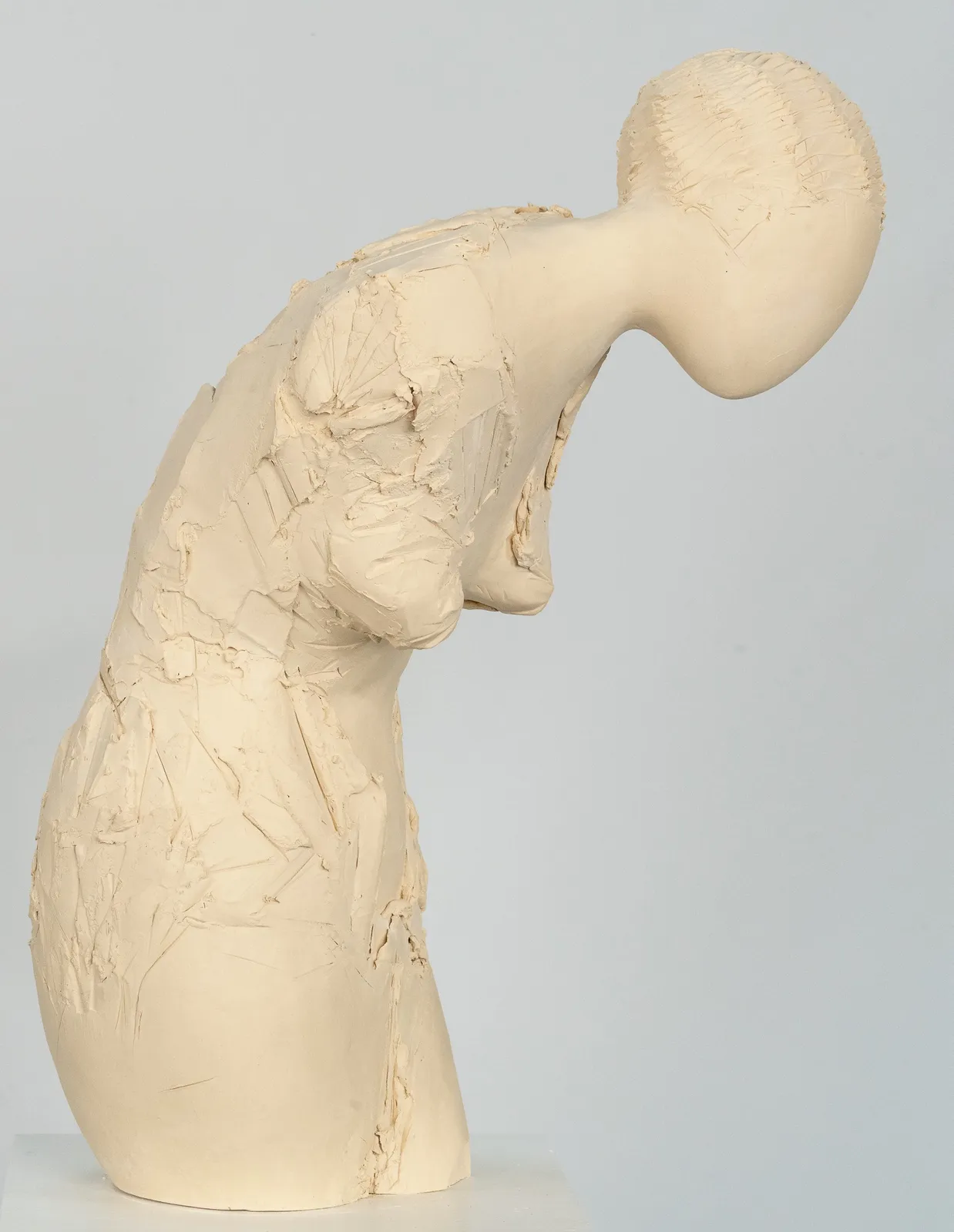 Fragmented figurative female torso in white ceramic. No. 3 in sculptor Emilio DiIorio's Sei donne series..