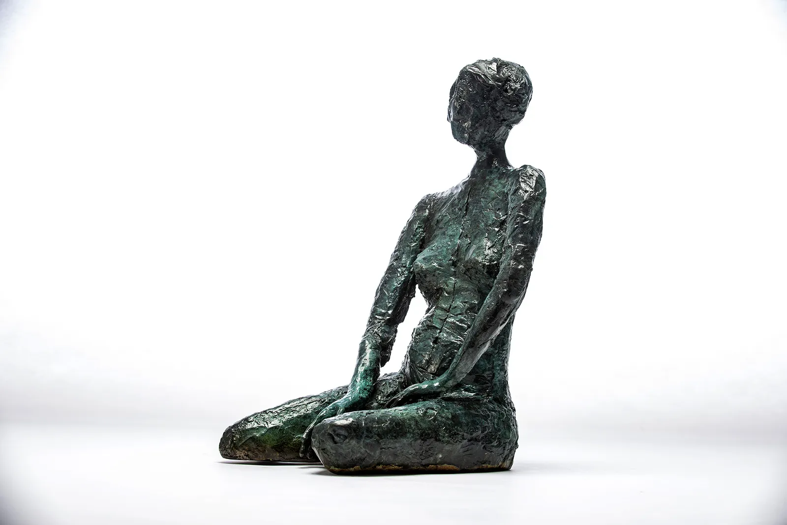 Bronze sculpture of two women by sculptor Emilio DiIorio.