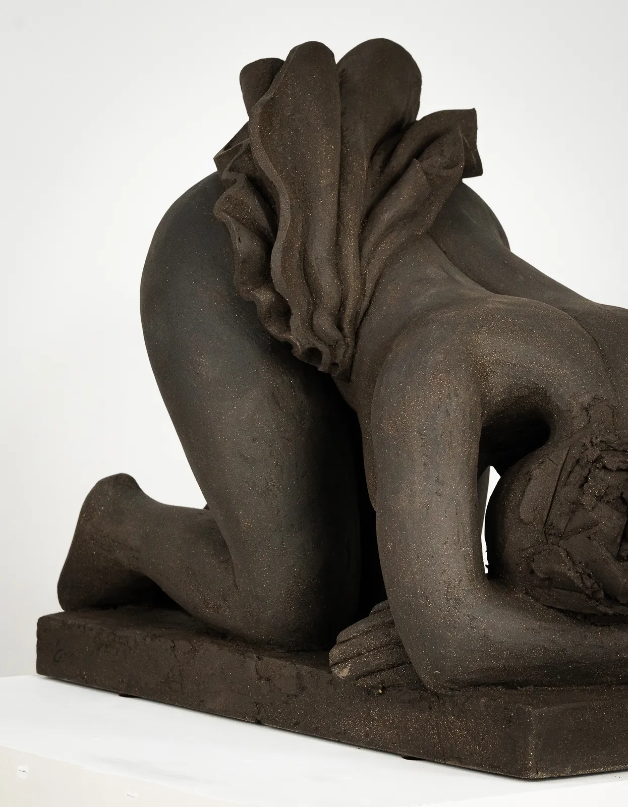 Figurative ceramics sculpture by artist Emilio DiIorio. Female figure is No. 5 in artist's Seated Bathers series in black clay.