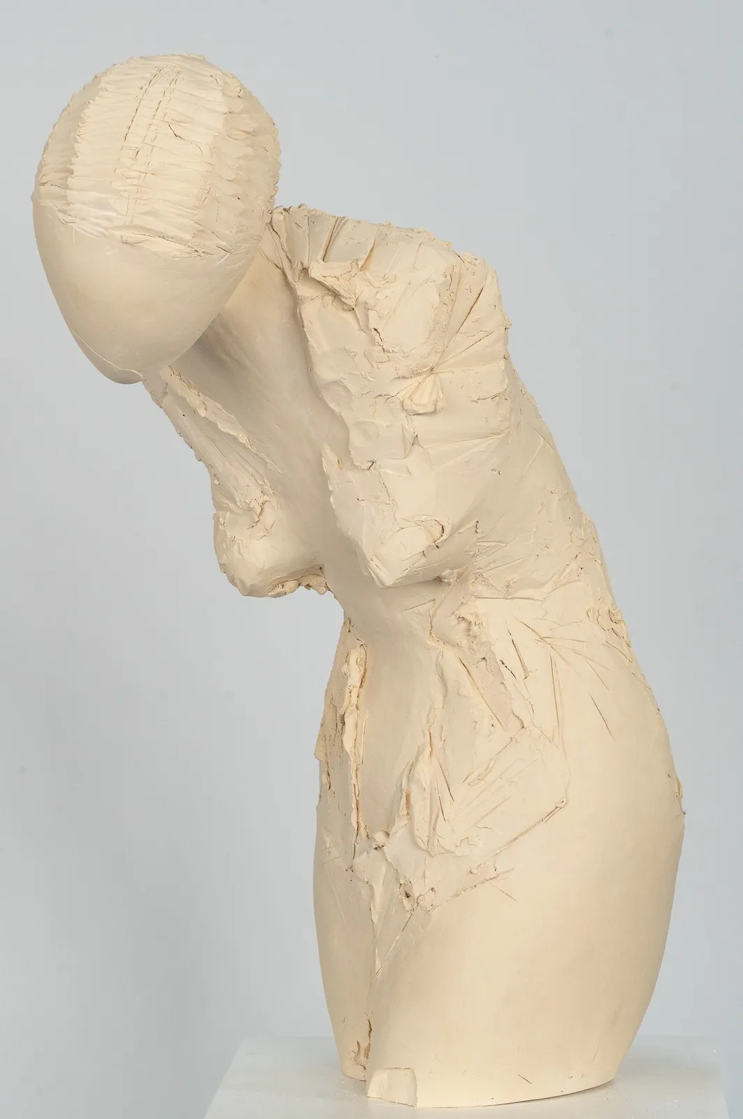 Fragmented figurative female torso in white ceramic. No. 3 in sculptor Emilio DiIorio's Sei donne series..
