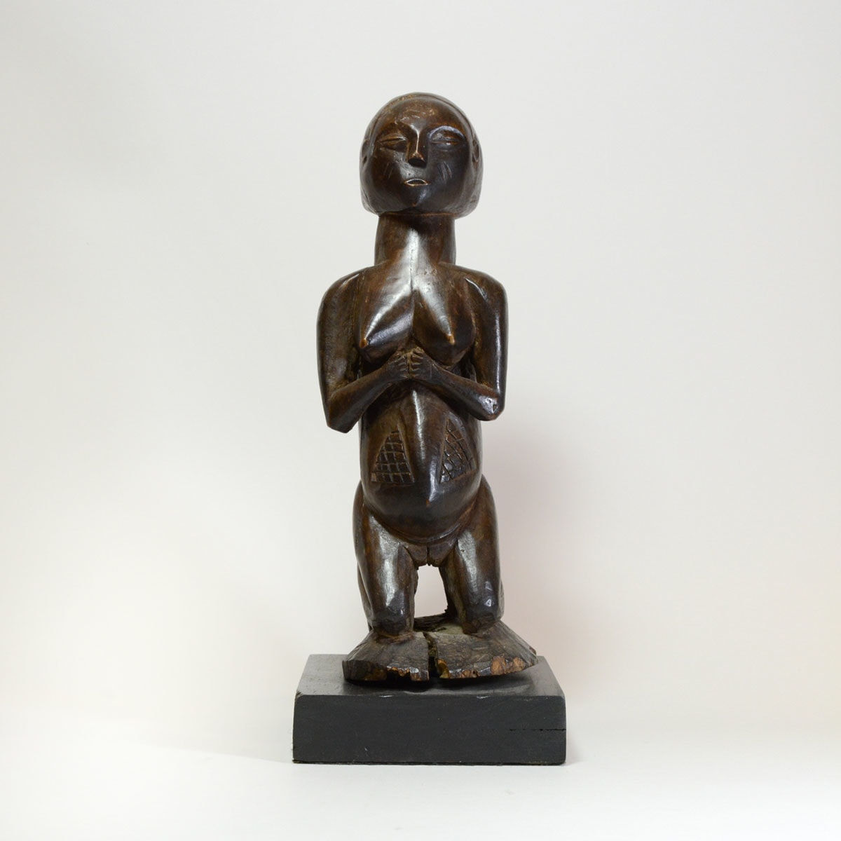 Shankadi Wooden Sculpture of a Kneeling Woman, 20th Century CE