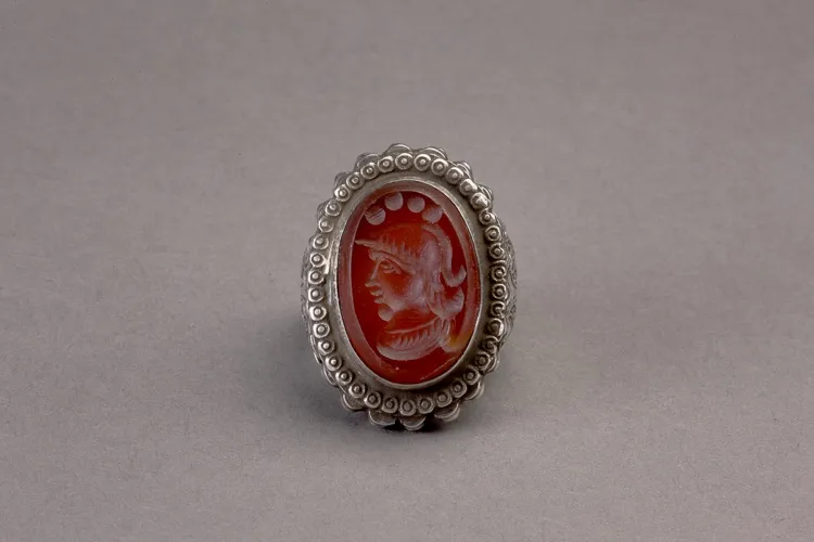 Silver Islamic ovoid ring with carnelian intaglio of a helmeted figure