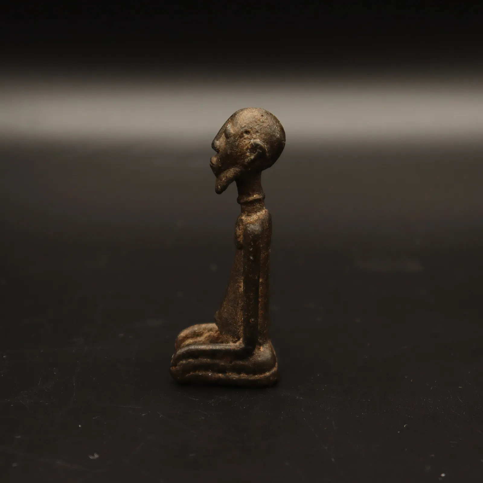 Dogon Sculpture of Kneeling Man, 14th Century CE - 15th century CE