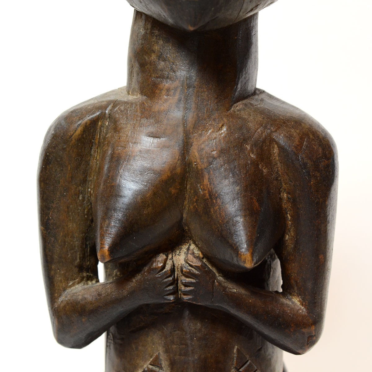 Shankadi Wooden Sculpture of a Kneeling Woman, 20th Century CE