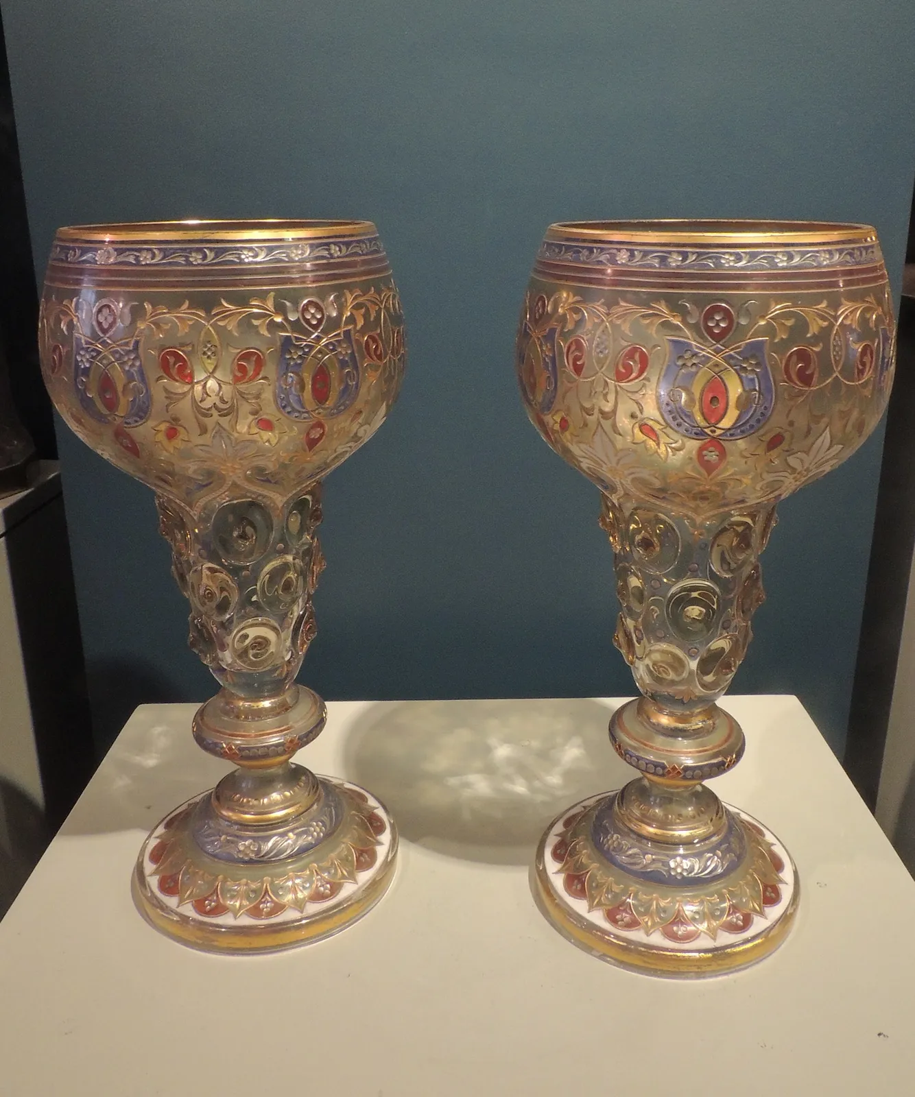 Pair of engraved chalices with floral decoration