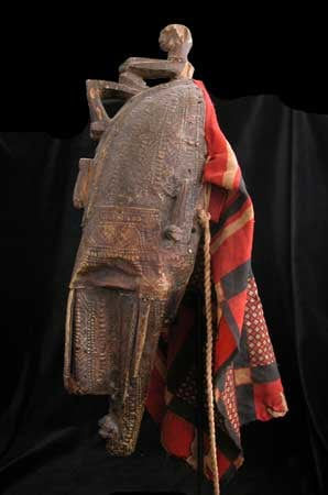 Marka Brass-Plaited Wooden Mask with a Colored Cloth, 20th Century CE