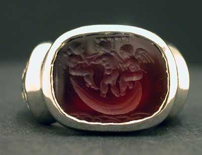 Roman Carnelian Intaglio Depicting Three Cupids, 100 CE - 300 CE