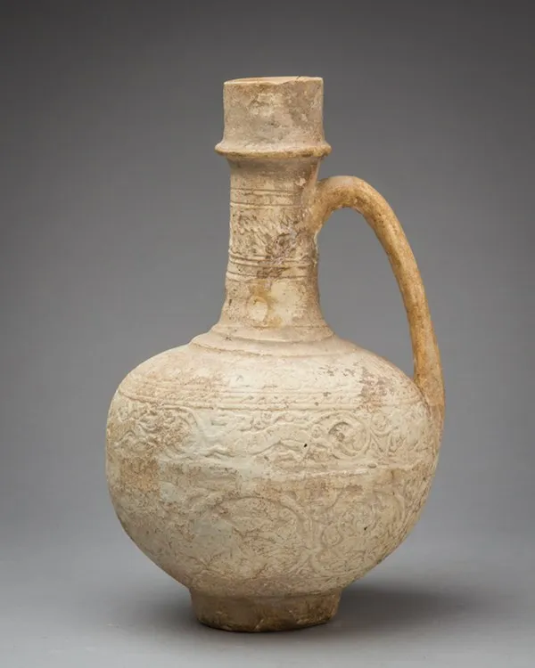 Islamic Earthenware Ewer of globular form and slender cylindrical neck, 800 CE - 1100 CE