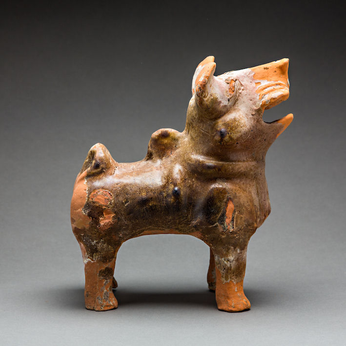 Han period glazed terracotta figure of a dog, 206 BCE - 220 CE