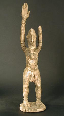 Dogon Wooden Sculpture of a Man with Raised Arms, 20th Century CE