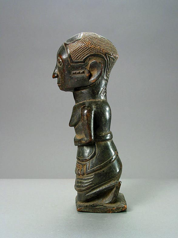 Kuba Wooden Sculpture of a Woman, 20th Century CE