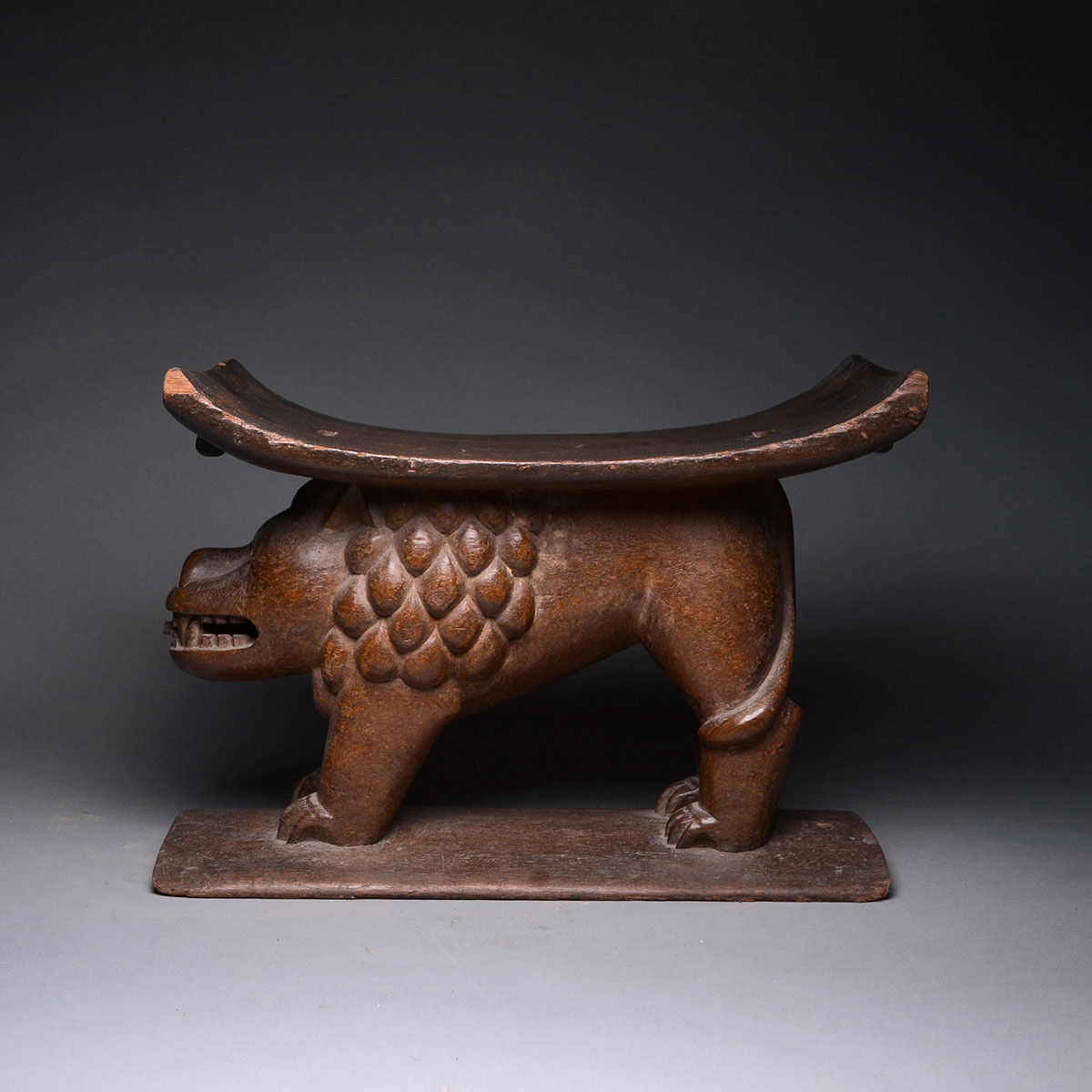 Asante Wooded Stool Supported by a Lion, 20th Century CE