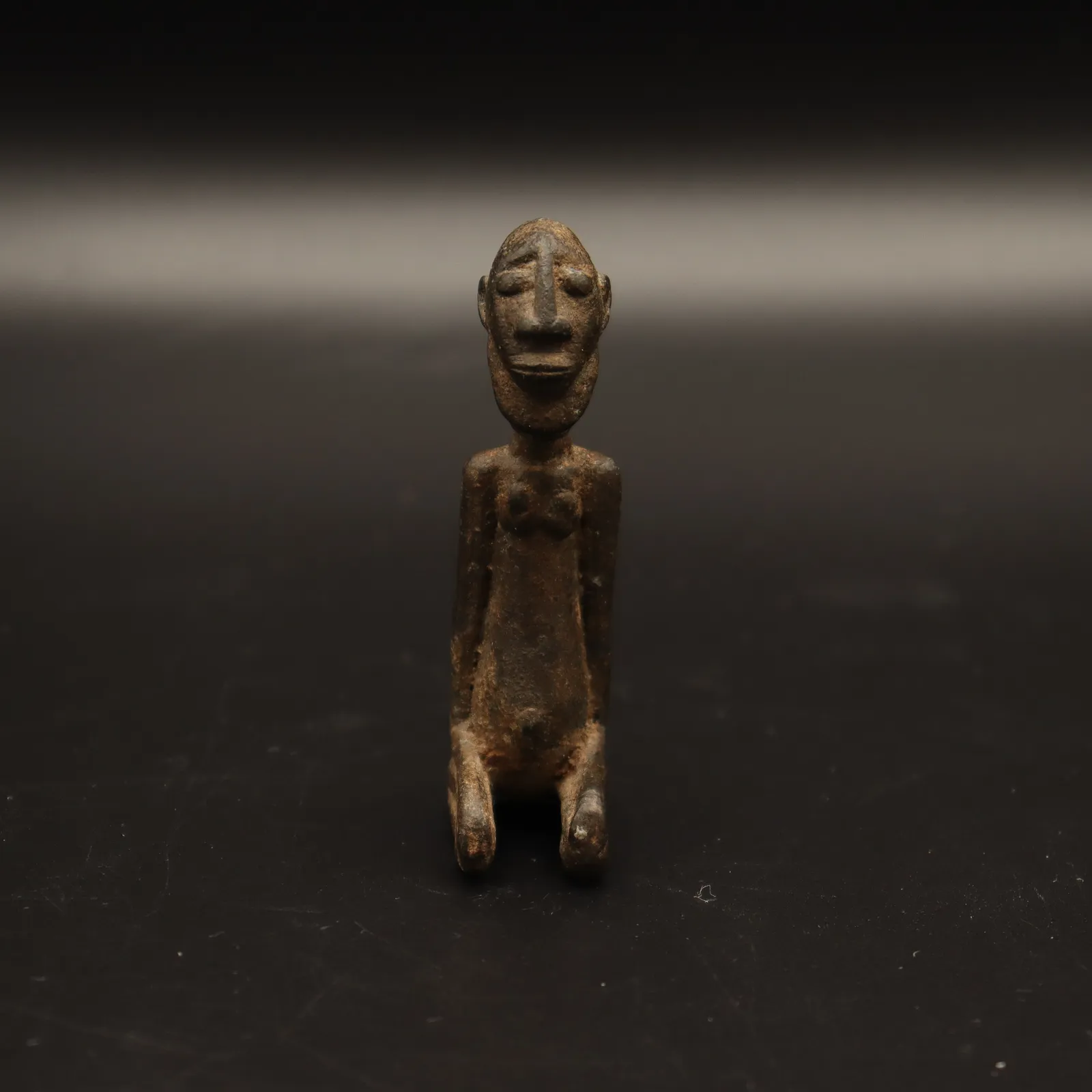 Dogon Sculpture of Kneeling Man, 14th Century CE - 15th century CE